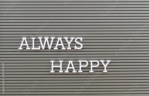 Obraz na płótnie Always happy written on plastic grey board
w salonie