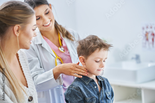 Little boy having medical examination by pediatrician
