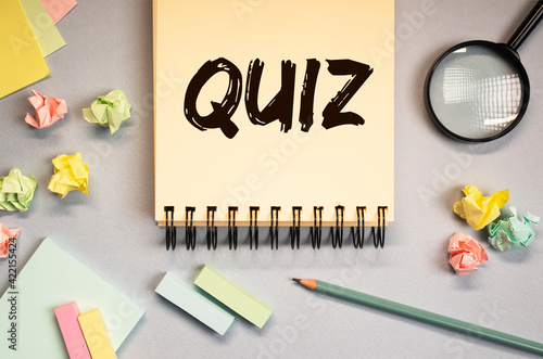 Quiz or quizz word, inscription, fun game with questions photo