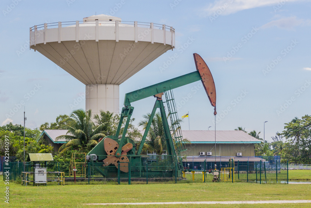 Oil well and water tower in Brunei
