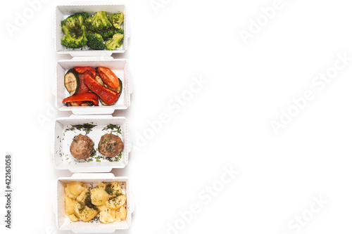 Daily food ration in containers. Delivery from restaurant  set of healthy food and balanced diet