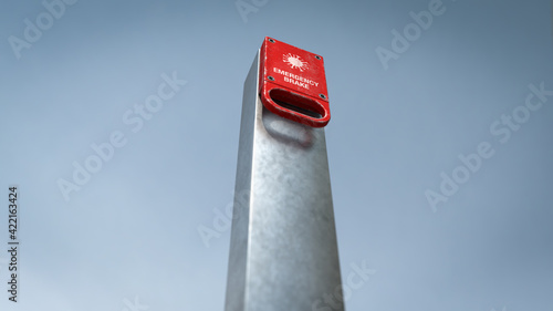 Red Emergency Brake Handle with Corona Virus in front a blue sky from a low angle
 (ID: 422163424)