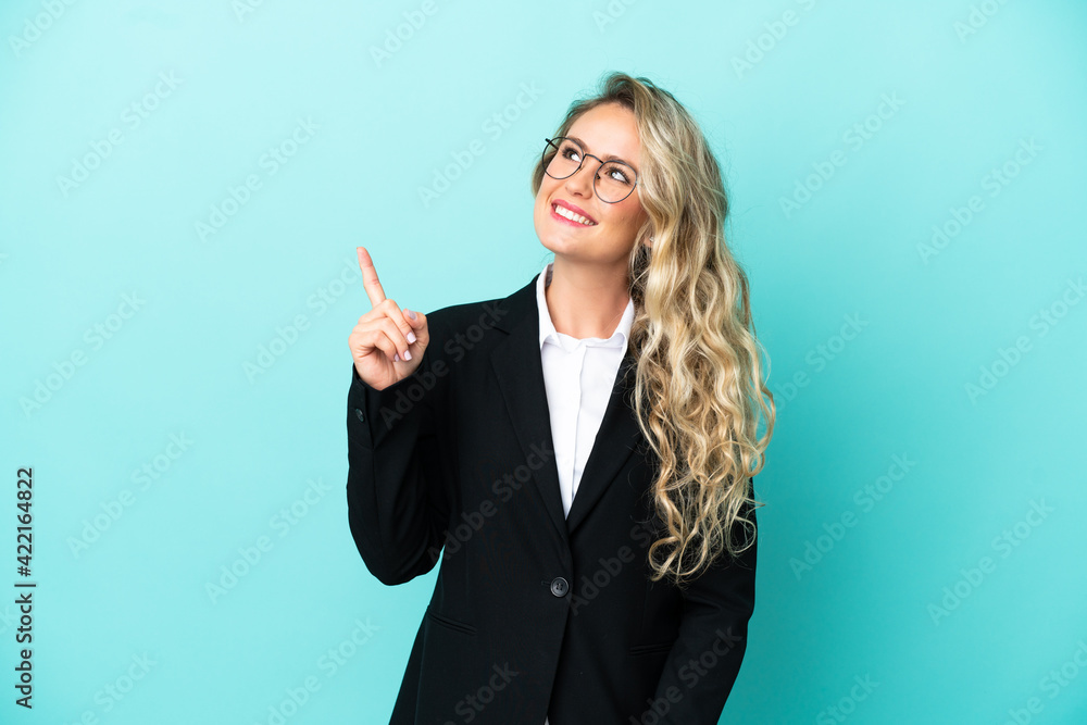 Brazilian business woman over isolated background pointing up a great idea Brazilian business woman over isolated background pointing up a great idea