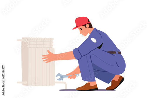 Plumbers Service, Heating Pipes Replacement. Worker with Spanner Tools Repairing, Installing House Heating Pipeline