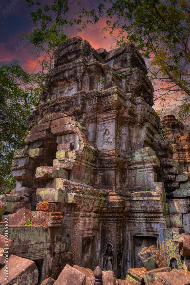 Fototapeta premium Ta Prohm Temple, near to Siem Reap, Cambodia. One of the most monumental temples on the territory of the Hindu complex Angkor in Cambodia. Located in thick jungle in a dilapidated condition. Roots
