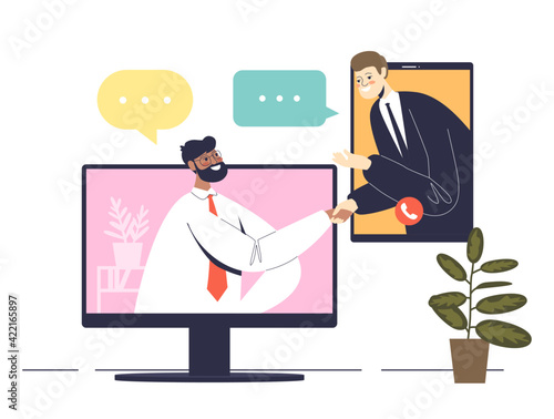 Two businessmen shaking hands from laptop and smartphone during online video conference meeting