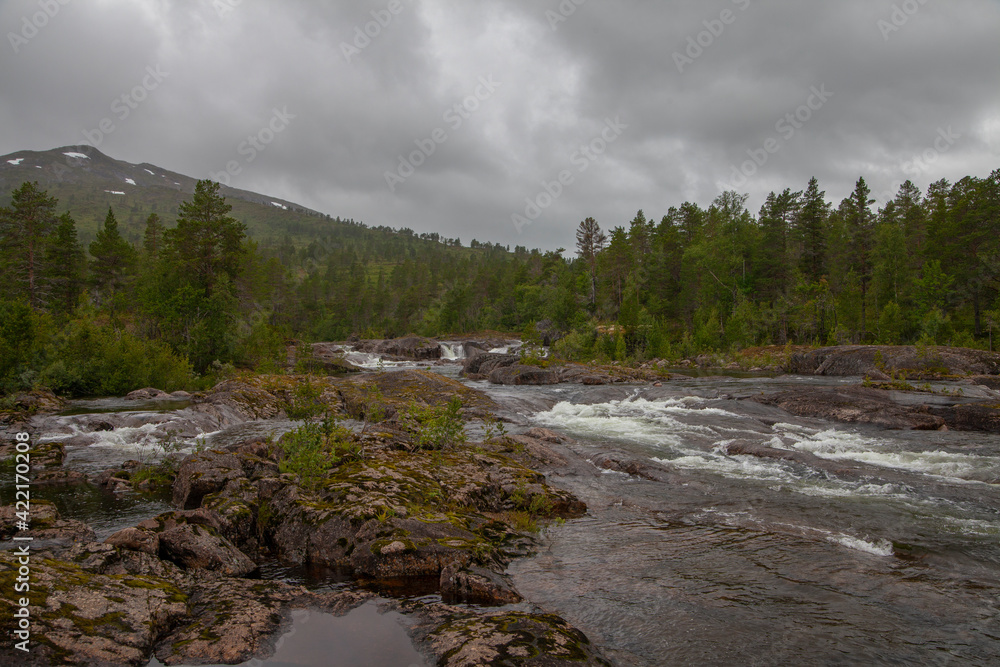River that flows through a mountain area called Trollheimen (Home of Trolls) in Norway River that flows through a mountain area called Trollheimen (Home of Trolls) in Norway
