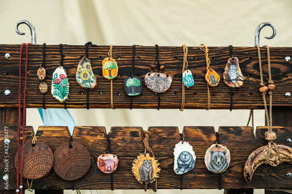 Assorted hand-painted wooden jewelry for sale