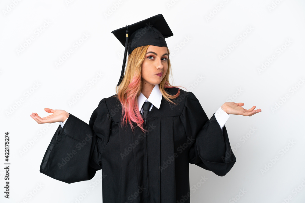 Young university graduate over isolated white background having doubts while raising hands Young university graduate over isolated white background having doubts while raising hands