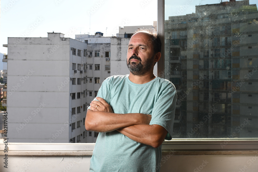 Fototapeta premium man series at the window during pandemic