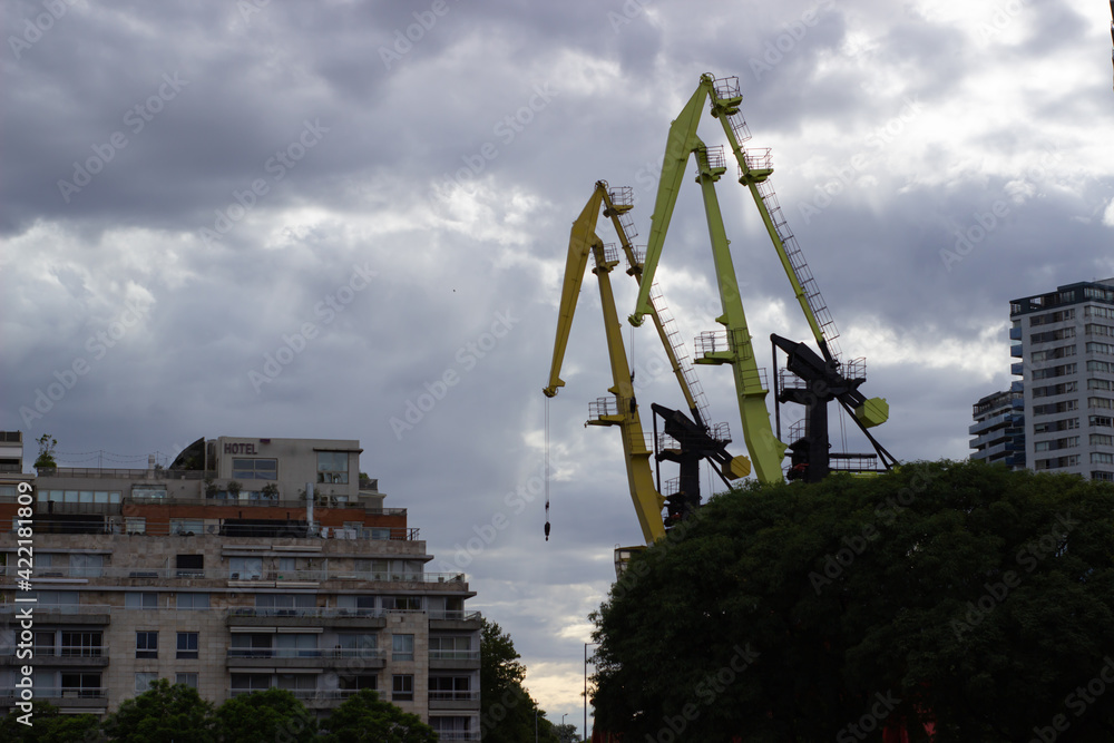 Old cranes in the city port.