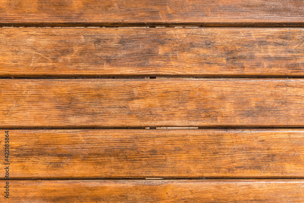 Horizontal old brown planks table texture background, top view