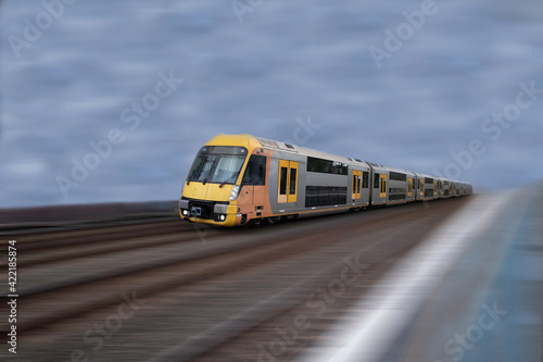 Commuter train approaching a train station Sydney NSW Australia
