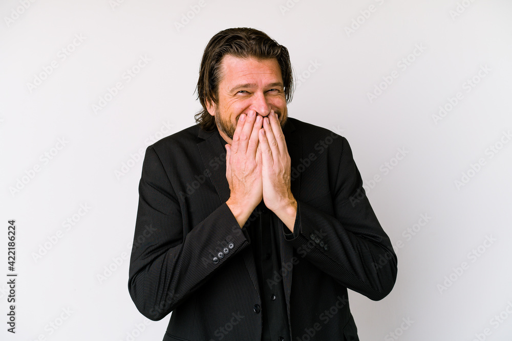 Middle age business dutch man isolated on white background laughing about something, covering mouth with hands. Middle age business dutch man isolated on white background laughing about something, covering mouth with hands.