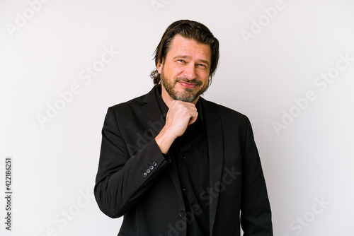 Middle age business dutch man isolated on white background cheering carefree and excited. Victory concept. © Asier