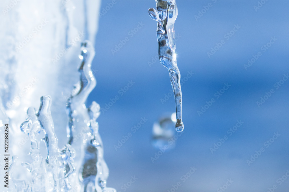 icicles sparkling white with water drops ice hanging down icicles sparkling white with water drops ice hanging down