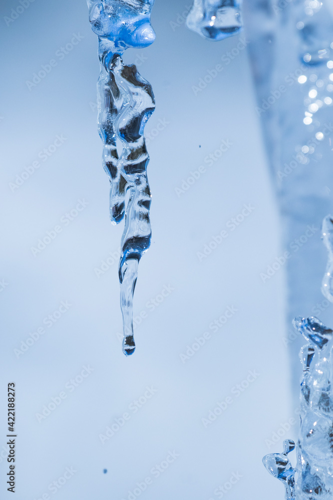 icicles sparkling white with water drops ice hanging down icicles sparkling white with water drops ice hanging down
