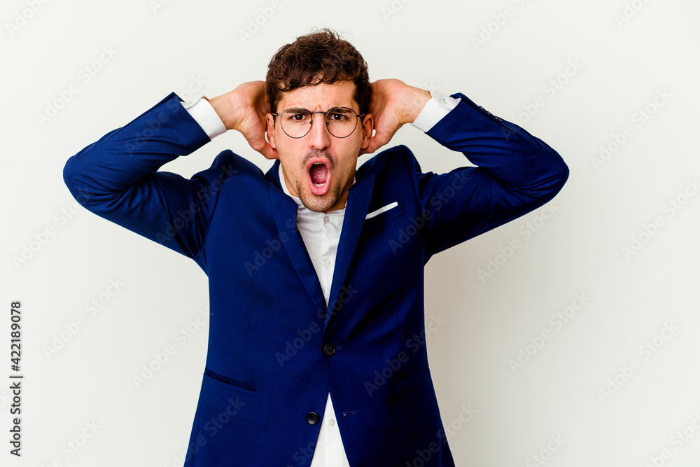 Young business caucasian man isolated on white background screaming with rage. Young business caucasian man isolated on white background screaming with rage.