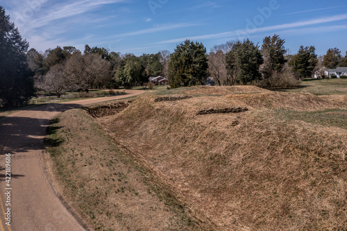 Closeup  view of Fort Hoke earthworks with cannon gun loopholes in Richmond Virginia defense line  protected the confederate city from the union forces, civil war battlefield trail, ditch photo