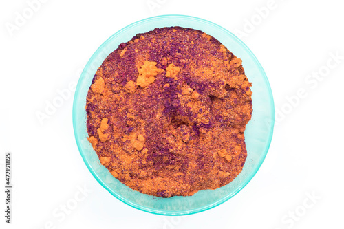Top view of Holi colorful traditional Holi powder in isolated bowls on a white background.