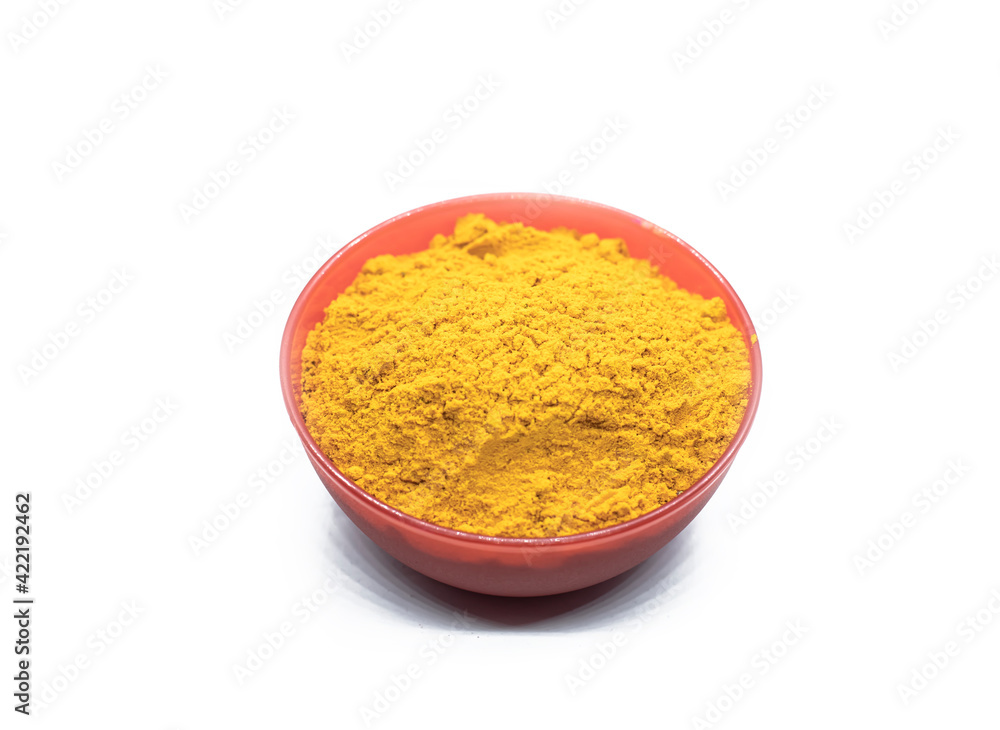 colorful traditional holi powder in bowls isolated on white background. colorful traditional holi powder in bowls isolated on white background.