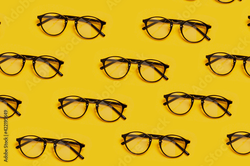 Hipster Black Glasses on Fashionable Yellow Background