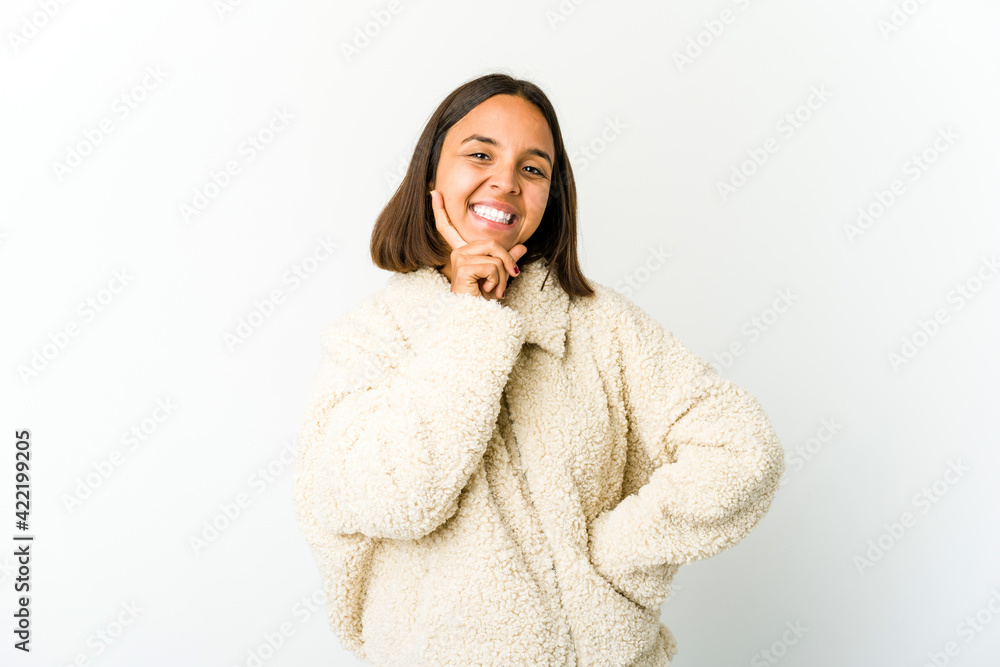 Young mixed race woman smiling happy and confident, touching chin with hand. Young mixed race woman smiling happy and confident, touching chin with hand.