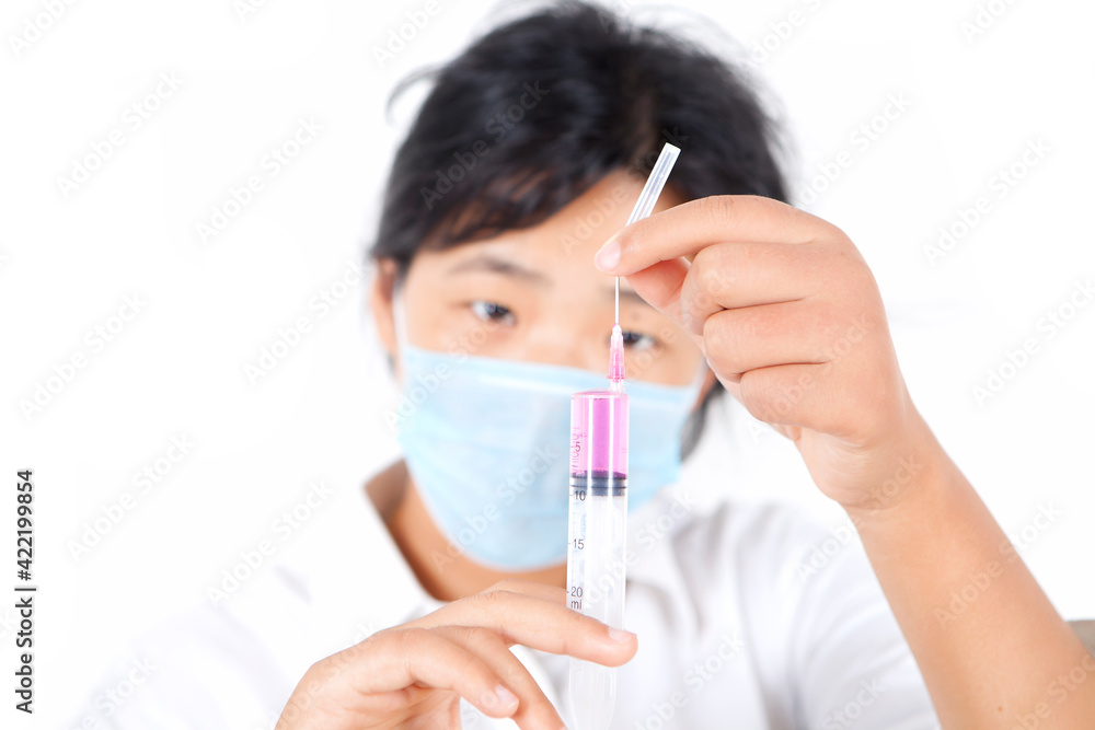 A doctor with a needle A doctor with a needle