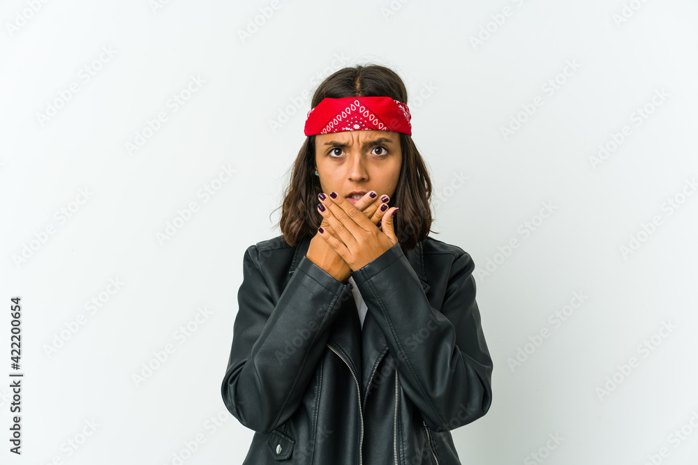 Young latin rocker woman isolated on white background Young latin rocker woman isolated on white background