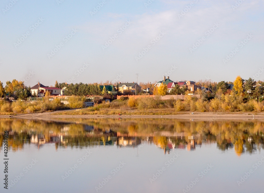 View of the autumnal bank of the Irtysh River in the Omsk Region.