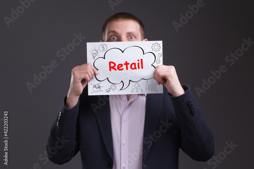 Business, technology, internet and network concept. Young businessman thinks over the steps for successful growth: Retail