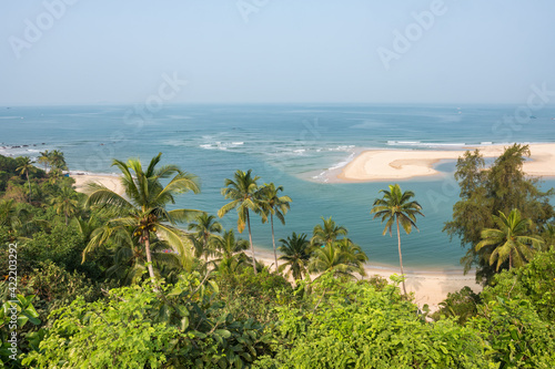 Tropical landscape with an empty beach in Maharashtra, Southern India photo