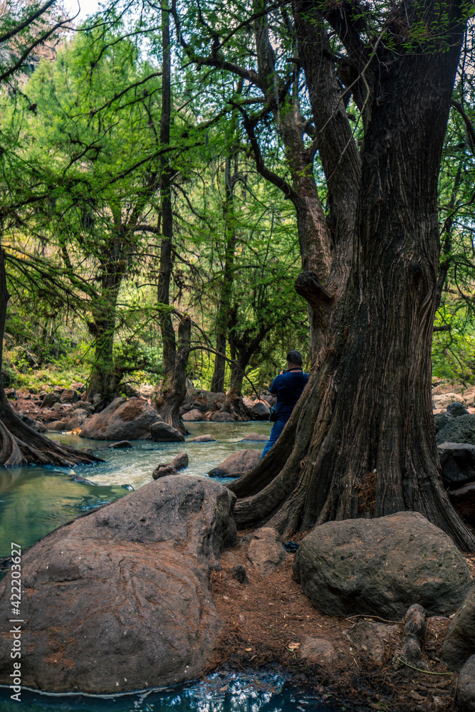 Presa Abriendo compuertas y soltando caudal de agua, wooden bridge, photographer Presa Abriendo compuertas y soltando caudal de agua, wooden bridge, photographer
