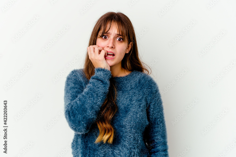 Young caucasian cute woman isolated on white background biting fingernails, nervous and very anxious. Young caucasian cute woman isolated on white background biting fingernails, nervous and very anxious.