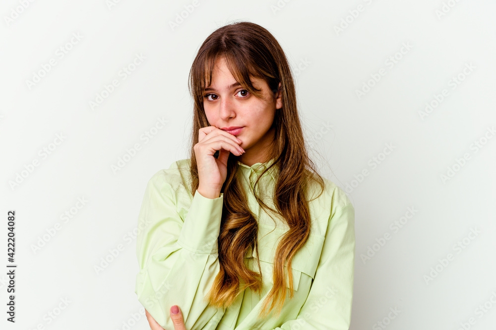 Young caucasian cute woman isolated on white background suspicious, uncertain, examining you. Young caucasian cute woman isolated on white background suspicious, uncertain, examining you.