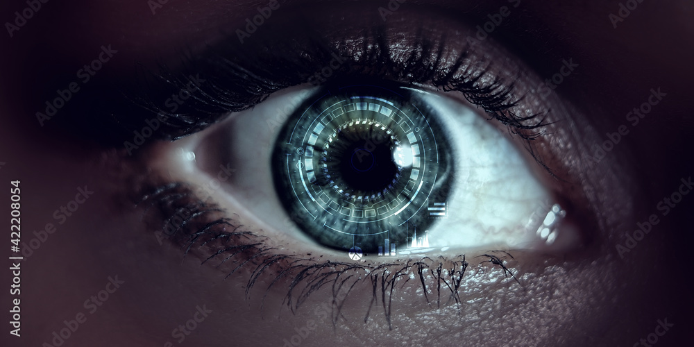 Fototapeta premium Close up of woman eye in process of scanning