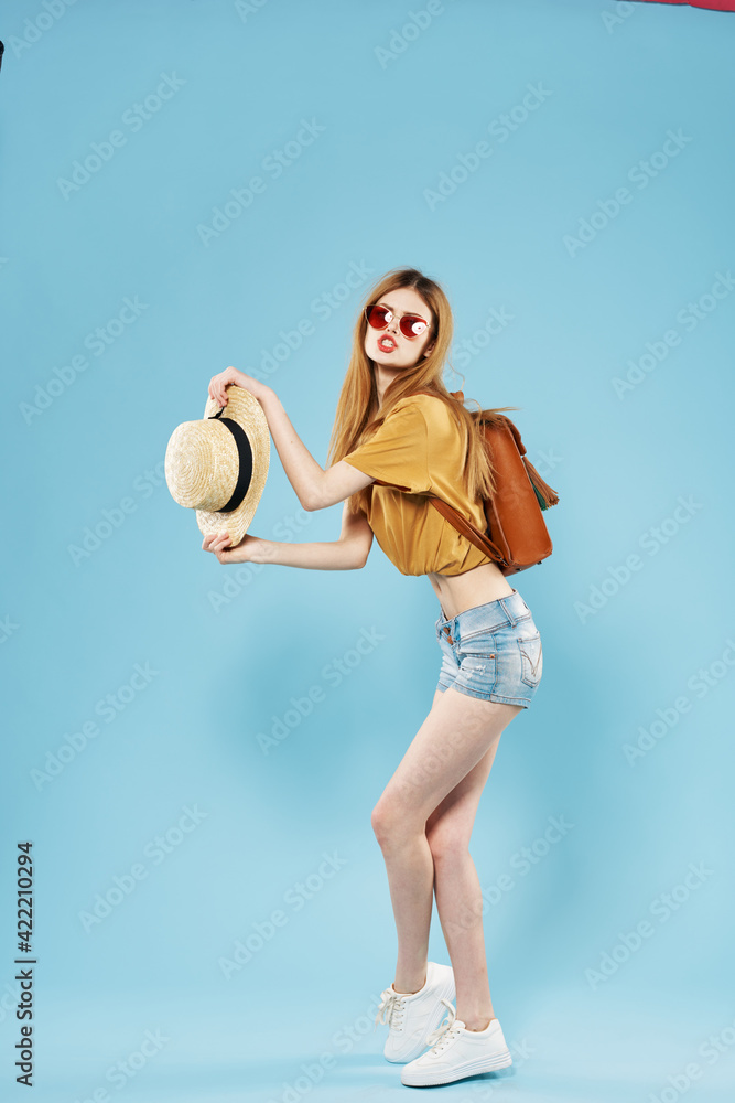 Cheerful pretty woman in hat and sunglasses hair backpack emotions 
