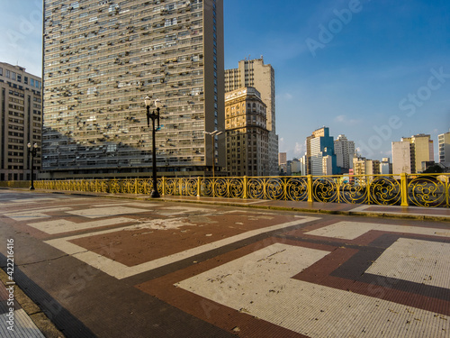 View of the Santa Ifigenia Viaduct with skyscraper building in the background, during the lockdown, to prevent Covid-19 in downtown Sao Paulo photo