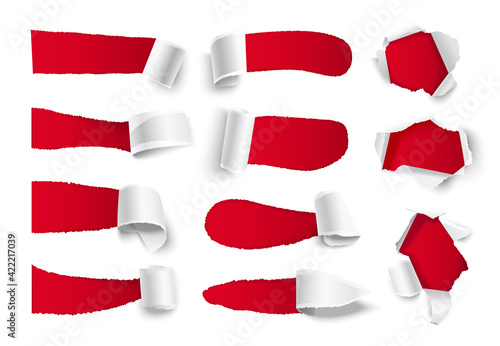 Isolated sheets of torn white paper on a red background.