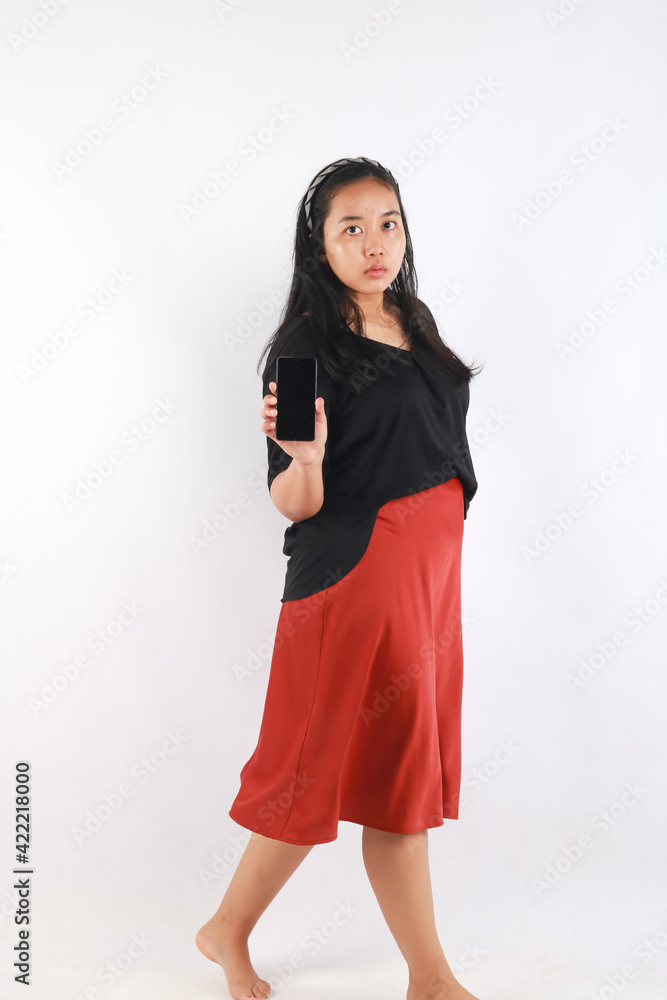portrait of Asian Woman using smartphone on white background portrait of Asian Woman using smartphone on white background