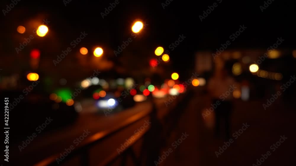 Blurred moving cars, bokeh traffic city street lights at night, abstract lights Blurred moving cars, bokeh traffic city street lights at night, abstract lights