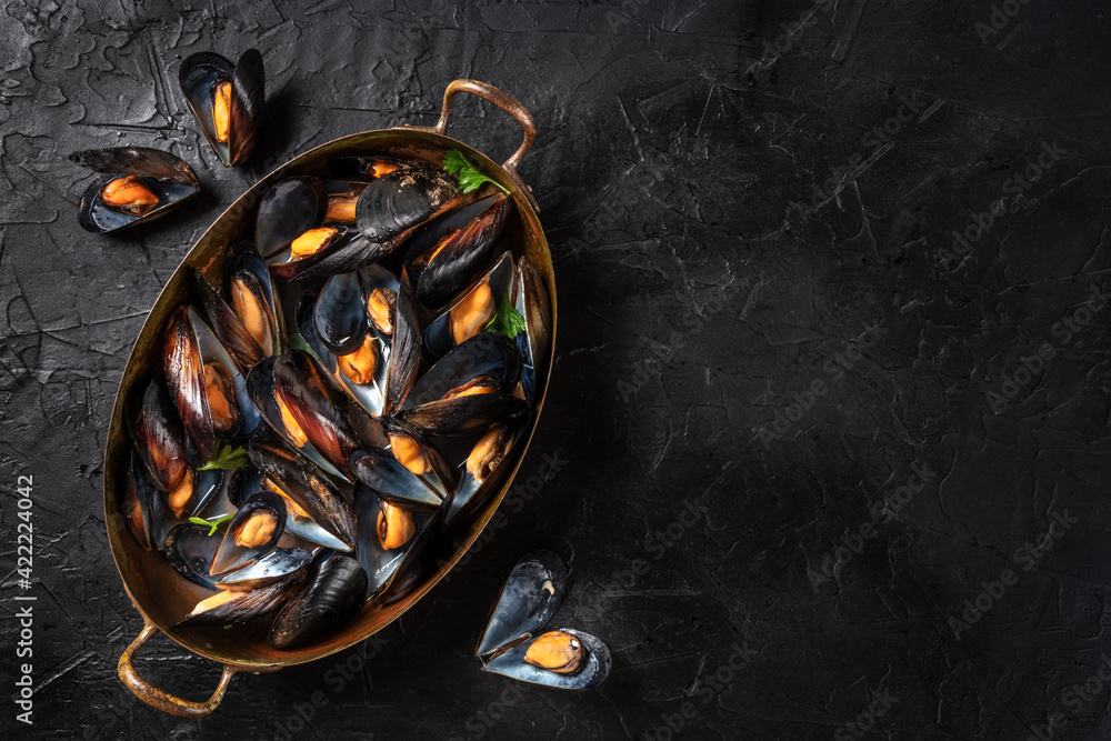 custom made wallpaper toronto digitalCooked mussels in a pan, overhead shot on a black background