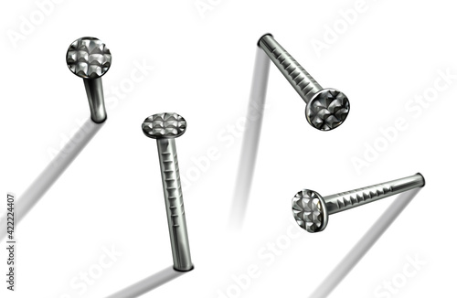 Steel nails with circle head hammered in wall