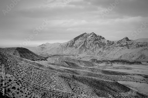 Black and white photo of Yeranos mountains near Garni in Armenia on a snowy winter day