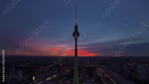 TV Tower in Berlin Germany with a beautiful pastel sunset, wide shot  photo