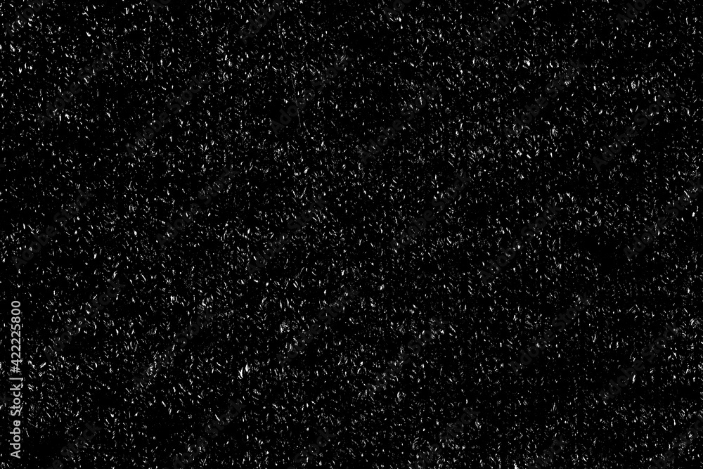 Chaotic white bokeh on a black background. light spots texture, abstraction. falling snow. starry sky. bright glare of light texture Chaotic white bokeh on a black background. light spots texture, abstraction. falling snow. starry sky. bright glare of light texture