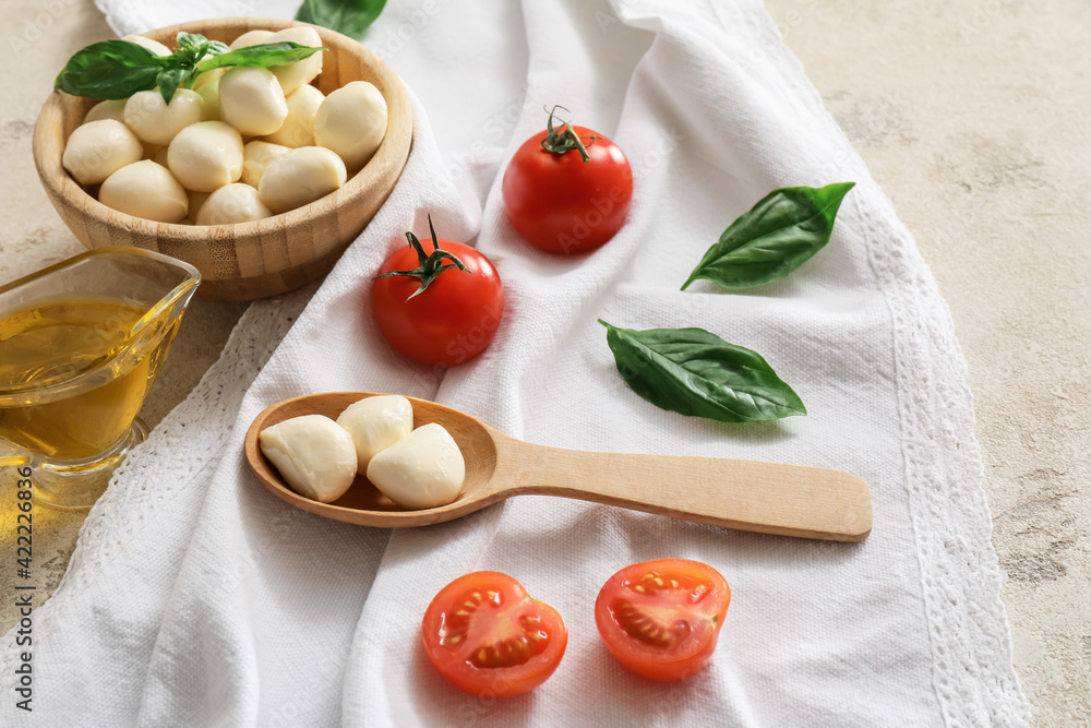 Composition with mozzarella cheese on grunge background Composition with mozzarella cheese on grunge background