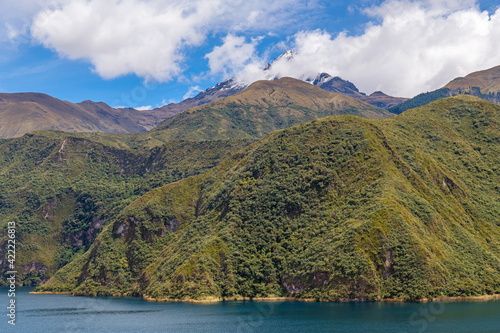 Cuicocha volcanic crater lake with the Cotacachi volcanic peak with snow near Otavalo, Quito Region, Ecuador.