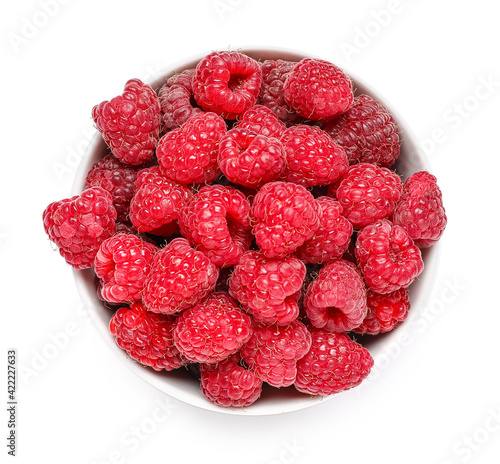 Bowl with fresh ripe raspberry on white background