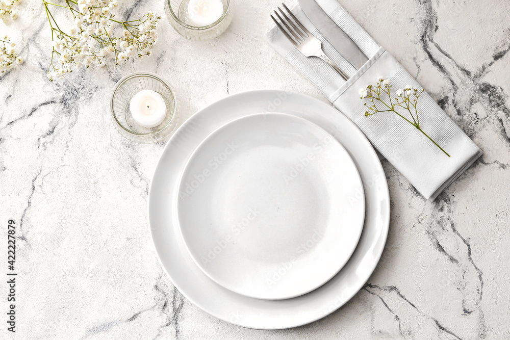 Ταπετσαρία Beautiful table setting with burning candles and floral decor on light backgroun